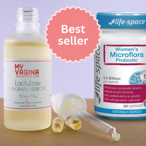 A bottle of lactulose, dropper cap off, sits with two full vegetable capsules and a jar of Life-Space Women's Microflora Probiotics.