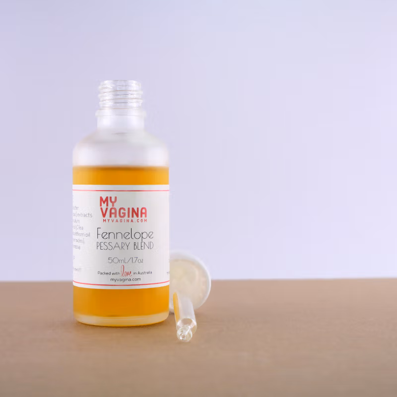 The very very handsome clear bottle has the white capped eye dropper positioned oh so well next to it.