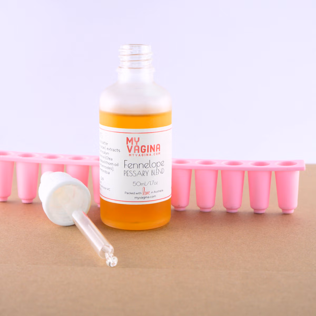 The Fennelope bottle is gorgeous and the liquid gold inside is an orange colour, due to the sea buckthorn oil. The clear bottle sits up against the free pink suppository mould, with the eye dropper for easy administration.