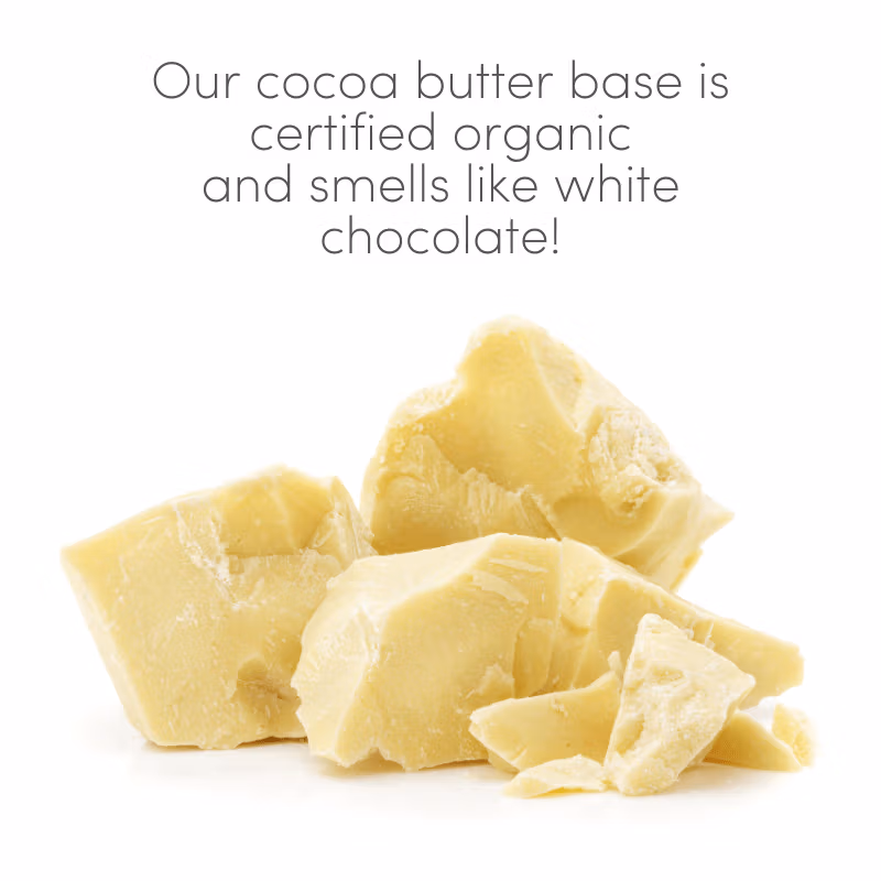 A pile of raw organic cocoa butter sits on a table, smelling like white chocolate.