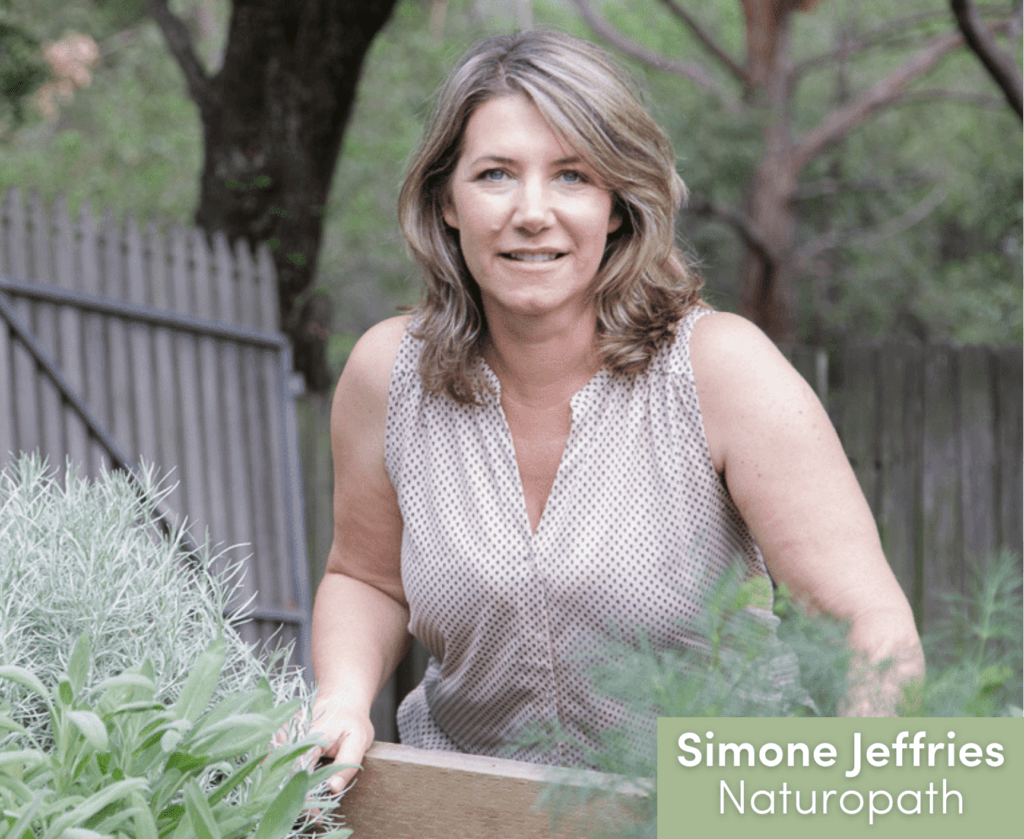 Simone Jeffries picking herbs in the garden. She loves herbs!