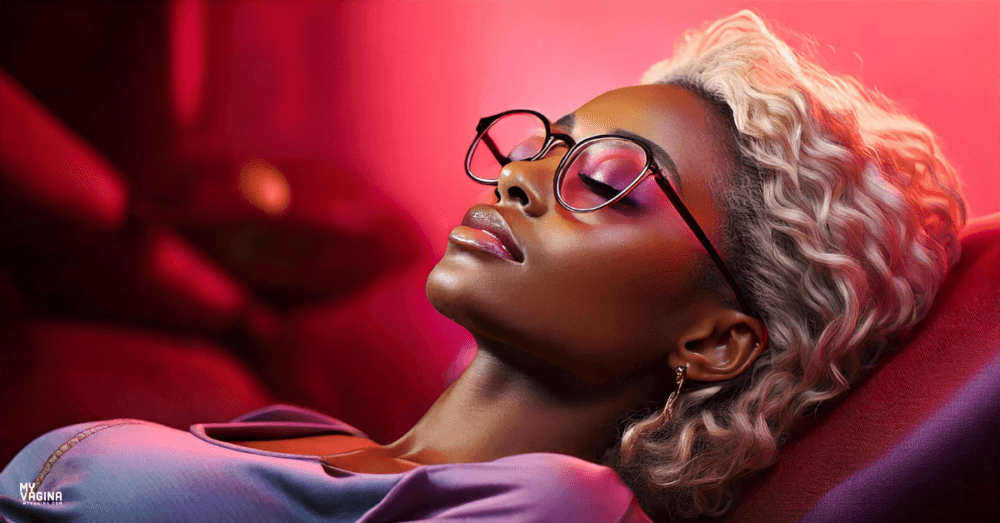 A woman lies on her lounge on her back, blonde hair and glasses, probably as she felt faint from POTS